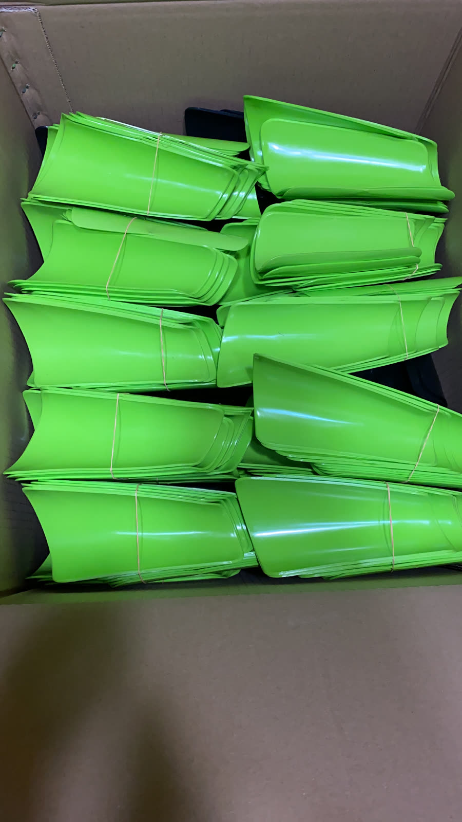 Recycled-plastic shin guards, production batch